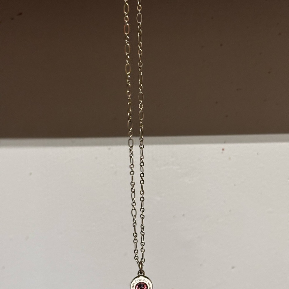 Coach Silver Necklace- White “COACH” Charm with Pink Rhinestone Center - Picture 4 of 8